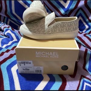 Girl Michael Kors shoes.